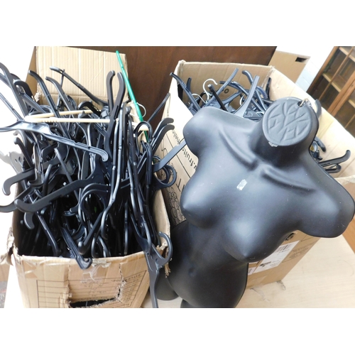 835 - Two boxes of coat hangers and a hanging mannequin