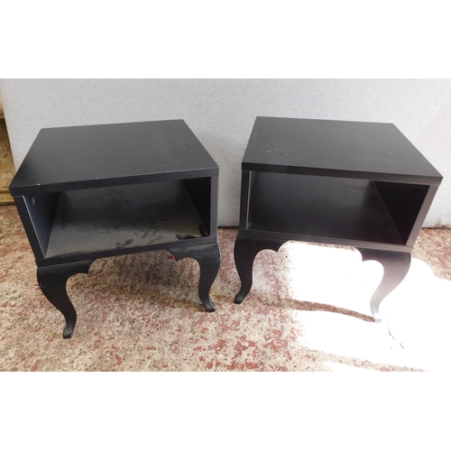 843 - Two black side tables