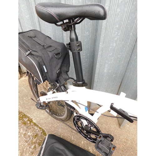 558 - Ecosomo folding bike and Ridge carry bag, 7 gears, owners manual, rear panier with bag and combinati... 