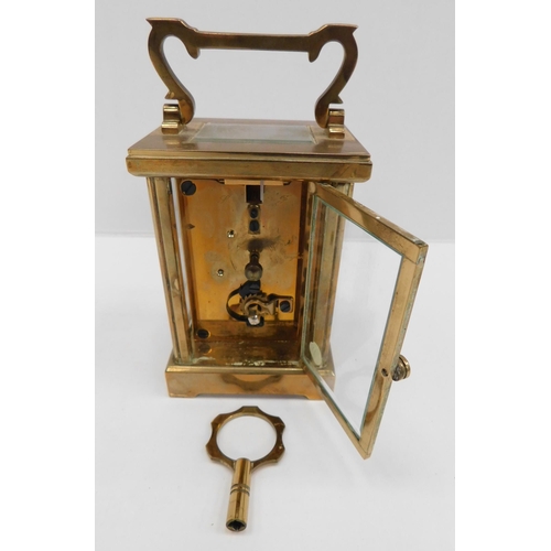 97 - Brass cased - carriage clock & key W.O.