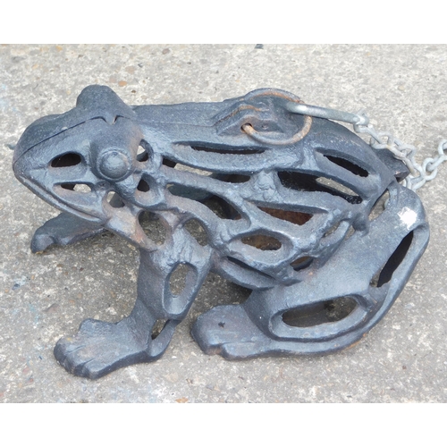 776A - Cast iron frog lantern on a chain to hang up