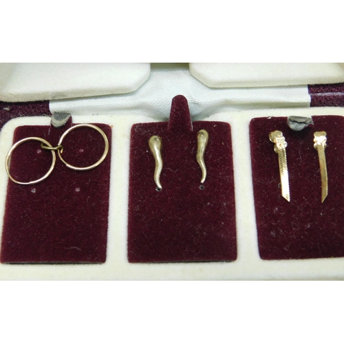 113 - Three/pairs of 9ct gold earrings - including hoops & drops