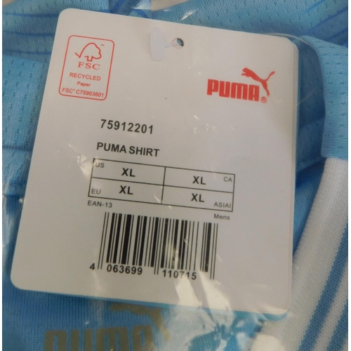 605 - New and bagged Puma replica football shirt - size XL Manchester City