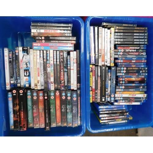 634 - Four boxes of DVDs