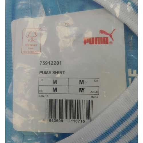 645 - New and bagged Puma replica football shirt - size M Manchester City