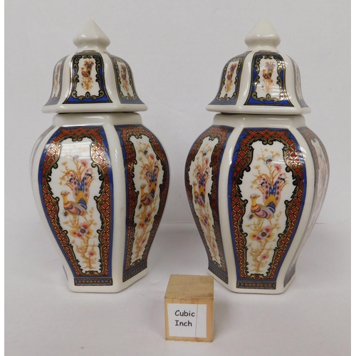 104 - Oriental style/lidded jars - signed to base/no damage