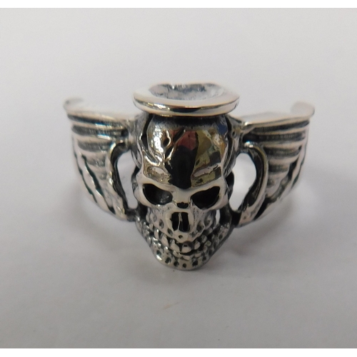 121 - Silver - winged skull/ring