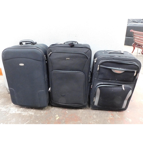 541 - Three suitcases