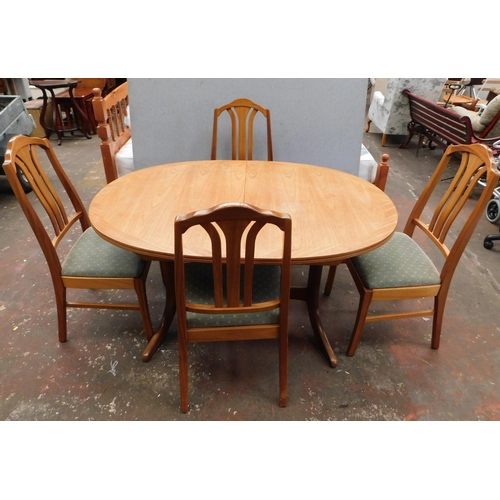 555 - Mid century teak extending dining table & four chairs