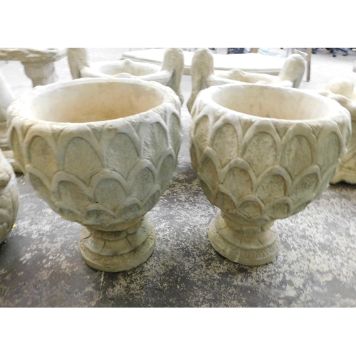 566 - Two stoneware planters on plinths