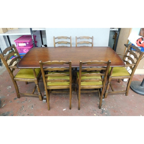 581 - Oak dining table and six chairs