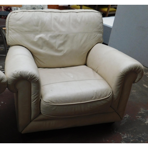 586 - Cream leather two seater settee and two armchairs