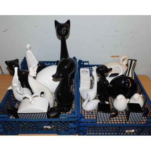 647 - Tray of black and white ornaments etc.