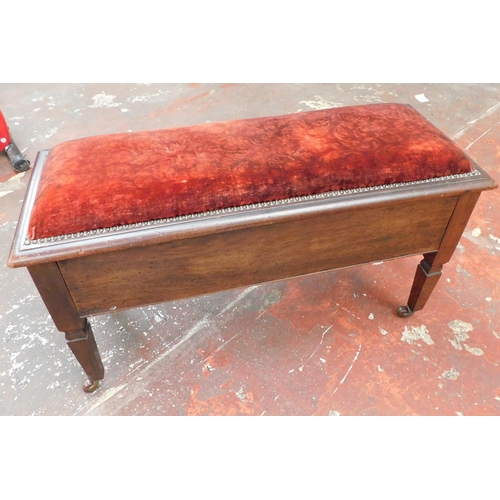 656 - Vintage oak piano stool on casters