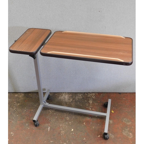 659 - Over chair adjustable table