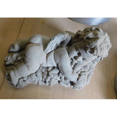 664 - Stoneware Cherub on bed of grapes - approx. 12