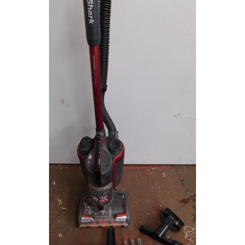 745 - Shark cordless upright vacuum and accessories - unchecked