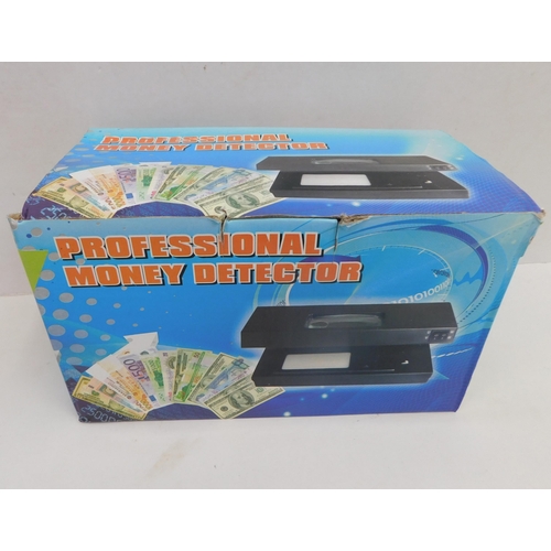 521 - New in box professional money detector