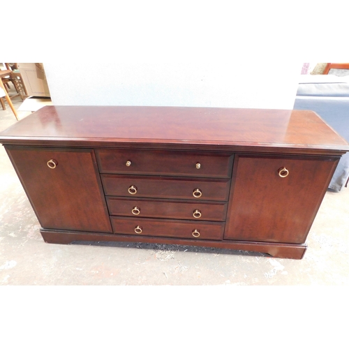 543 - Stag four drawer cabinet/sideboard