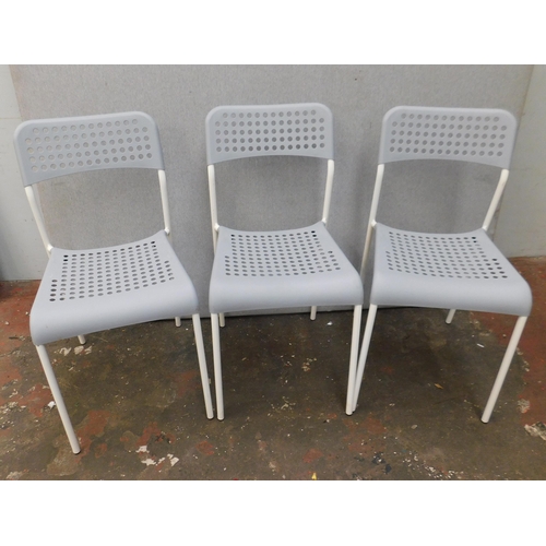 594 - Three metal and plastic chairs