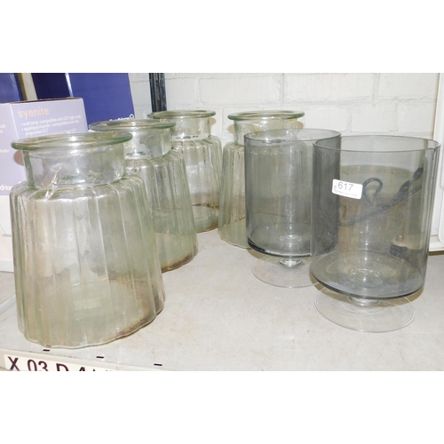 617 - Four large glass containers 10