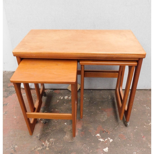 656 - Mid century nest of 3 tables with fold-out table top