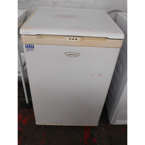 552 - Beko undercounter freezer W/O