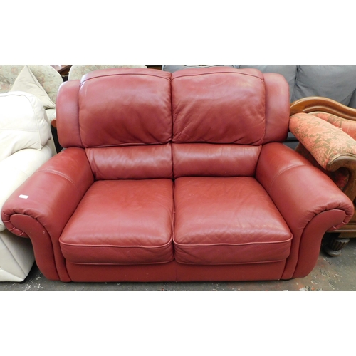 560 - Two seater leather sofa