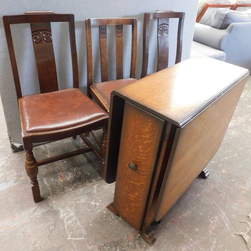 567 - Mid-century drop leaf table and three chairs