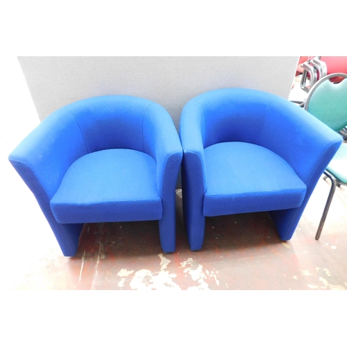 573 - Two blue tub chairs