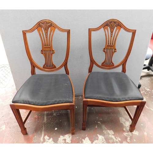 573A - Two carved dining chairs