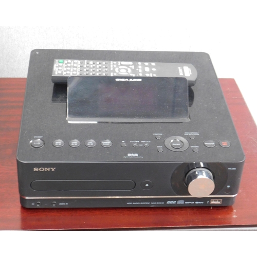 586 - Sony Giga-juke music system with speakers, cabinet, remote etc.