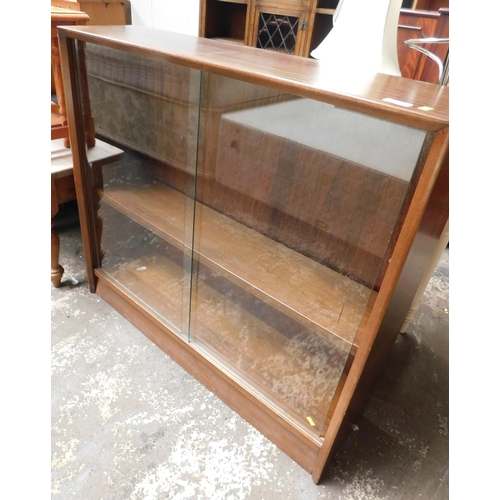 677 - Glass fronted bookcase