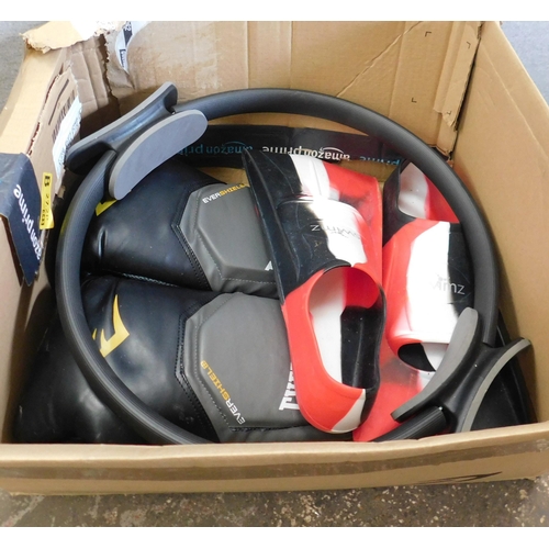 695 - Box of sports items incl. flippers, exerciser, boxing gloves etc.