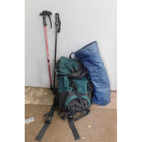 707 - Rucksack, walking poles and sleeping bag