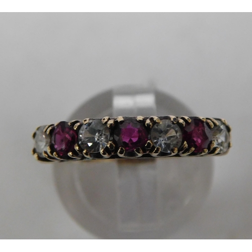 112 - 9ct gold - amethyst set 1/2 eternity ring - size M 1/2