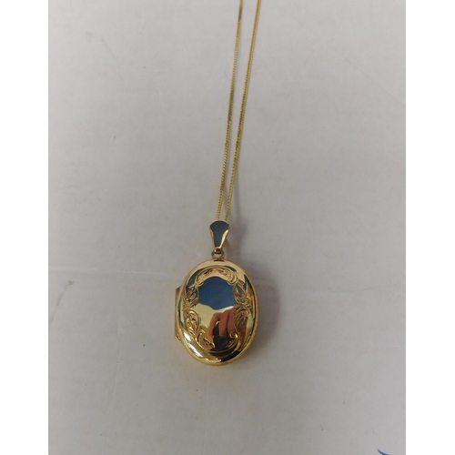 118 - 9ct gold - locket & chain