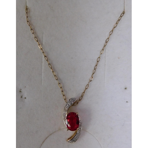 133 - 9ct gold - diamond & ruby set/pendant & chain