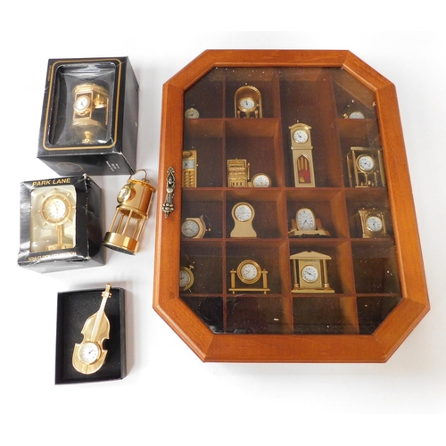 50 - Mixed/mini clocks including - eighteen clocks & display cabinet