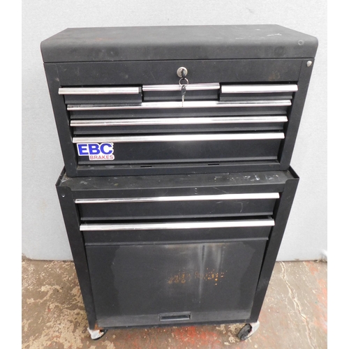 542 - Black metal toolbox on wheels, with lockable top - key in office
