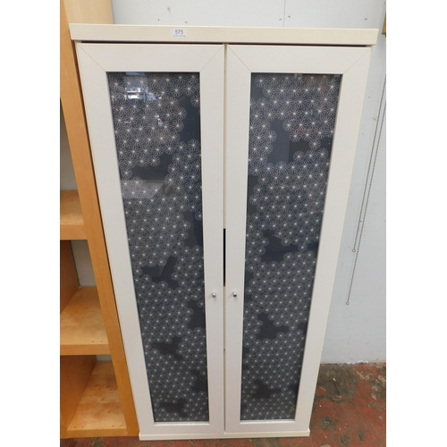 575 - Two door small wardrobe/storage unit with shelves