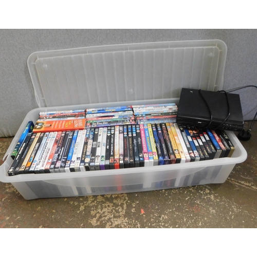 633 - Large box of DVDs with DVD player