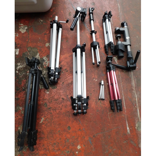 710 - Quantity of camera tripods and accessories