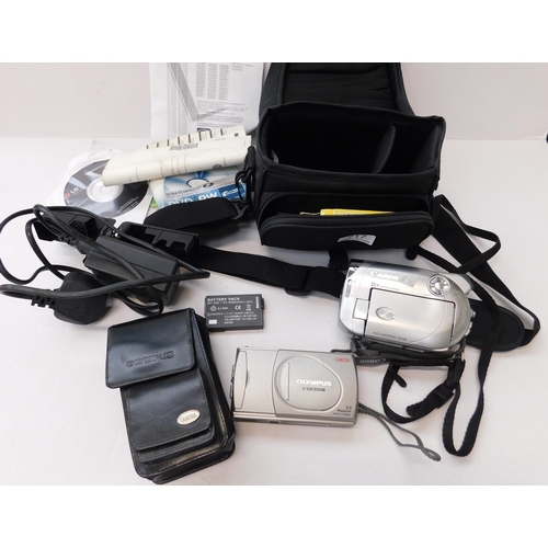 717 - Canon camcorder in carry case and ACC and Olympus camera and case