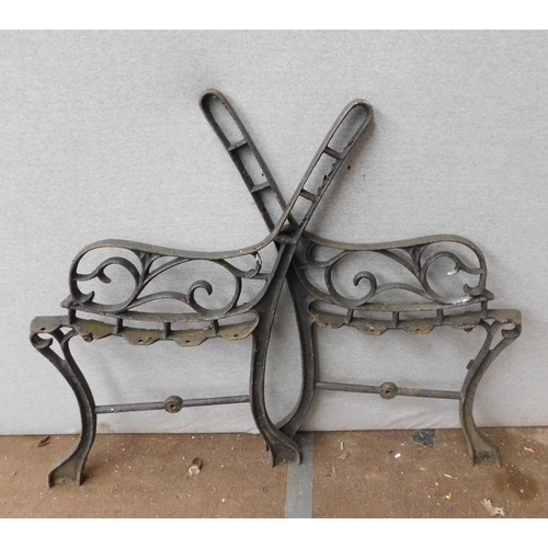 543 - Pair of lighter bench ends