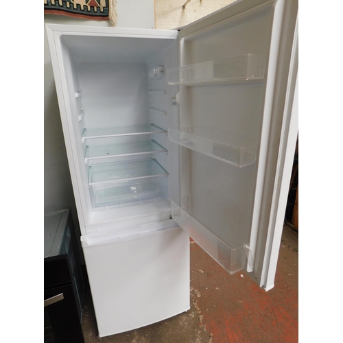 559A - Bush fridge freezer W/O - approx. 56