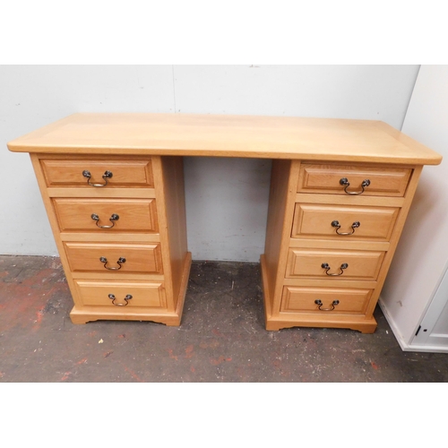 599 - Eight drawer pine desk