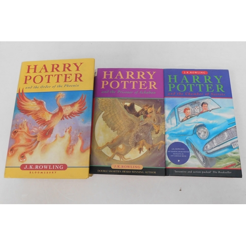 87 - Three - Harry Potter/hard back books & dust jackets - including Smarties 1997 1st edition