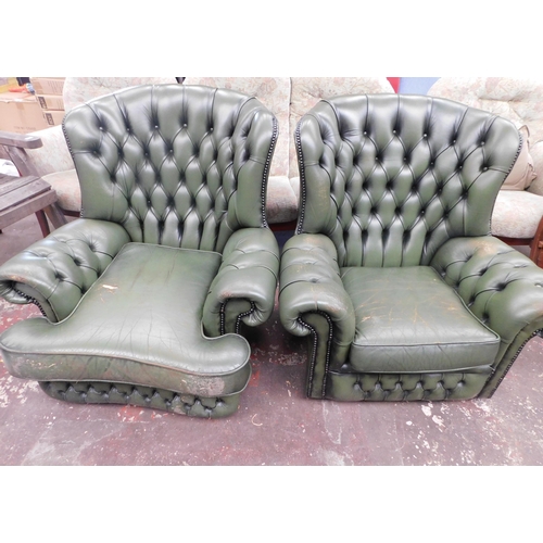 548 - Pair of green Chesterfield armchairs