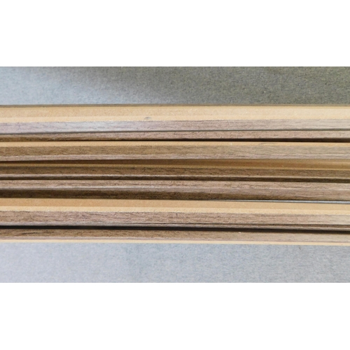 549 - Ten laminating beading strips - heritage oak